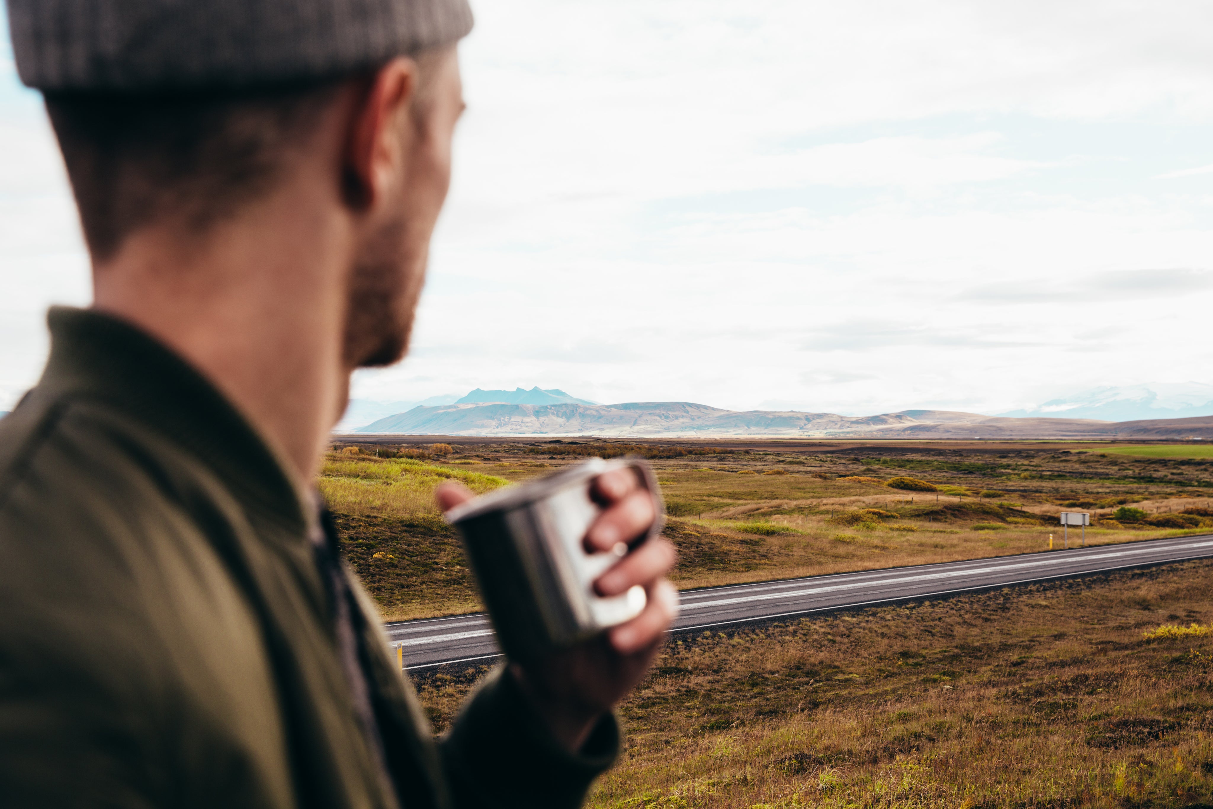 files/man-watching-the-road-landscape.jpg